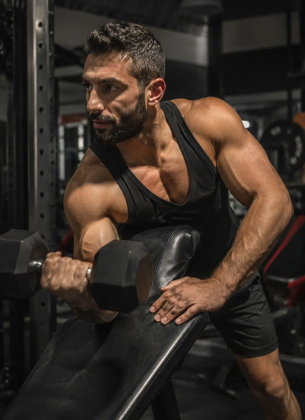 Man training with weights in the gym